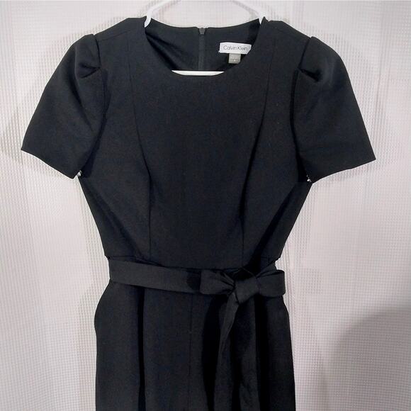 NWOT! CALVIN KLEIN! BLACK 1 PC BELTED WAIST, PUFF SLEEVE JUMPSUIT, ONESIE! SZ 4 - Picture 3 of 12